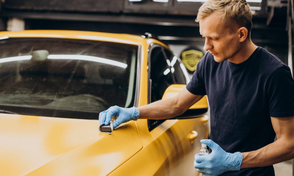 man-car-service-doing-car-ceramic-procedure.jpg