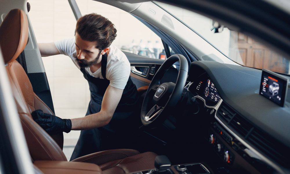 man-washing-his-car-garage.jpg